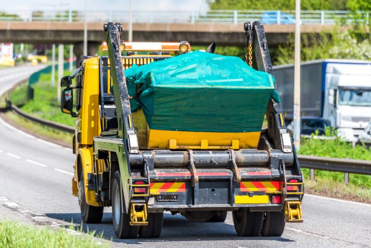 skip on a lorry